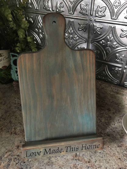HM Print & Design LLC rustic wooden recipe book and tablet stand with a distressed blue finish and engraved base.